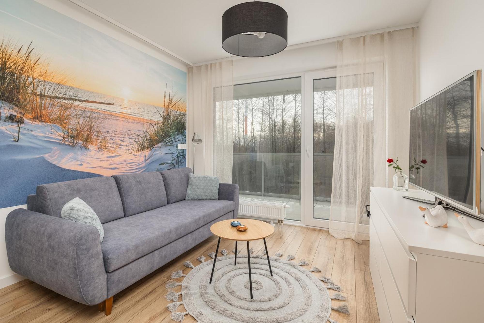 Coast With Large, Furnished Balcony In By Renters Apartment